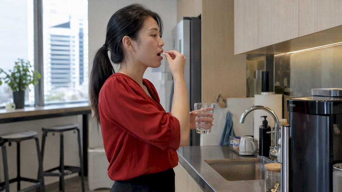 Professional taking a supplement capsule